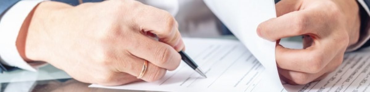 businessman-sitting-table-signing-documents-office-close-up_97716-105